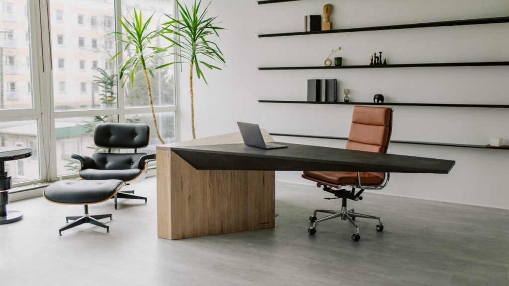 Modern office with a spotless desk and polished floors prepared for professional commercial cleaning